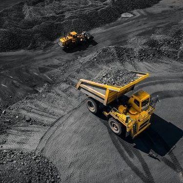 Haul trucks in an open pit mine